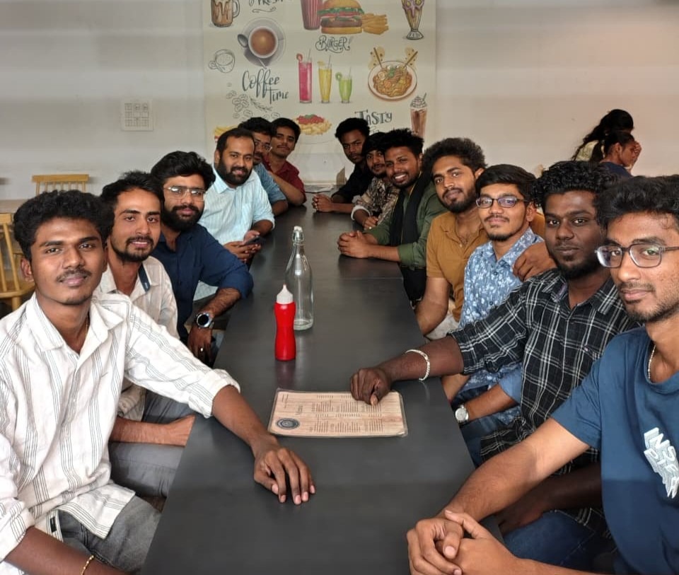 Noukha Technologies team members enjoying a meal together